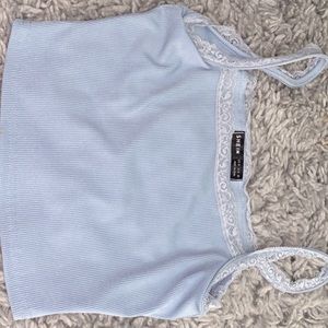 Baby blue lacey cropped tee .